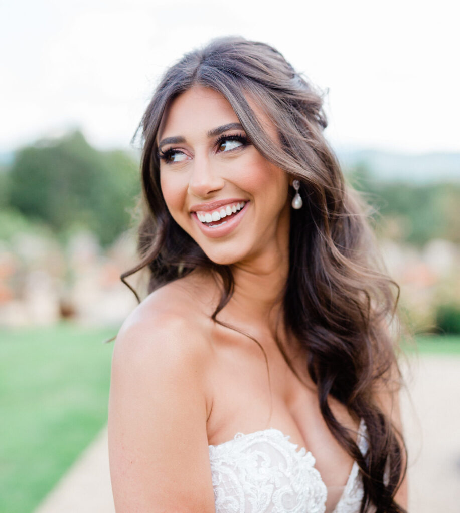 smiling bride in strapless wedding gown