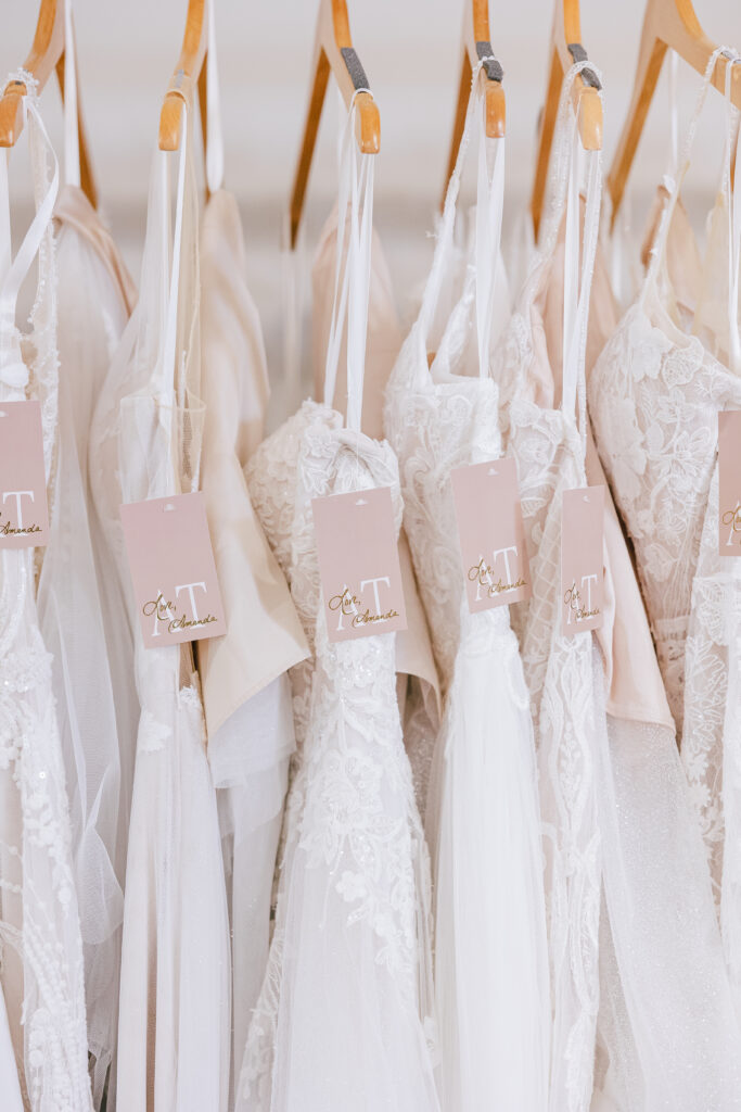 rack of white bridal dresses at Amanda's Touch