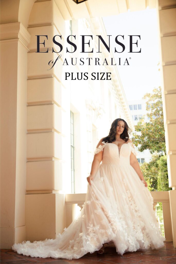 bride posing outside in a wedding dress with essense of australia plus size logo at the top