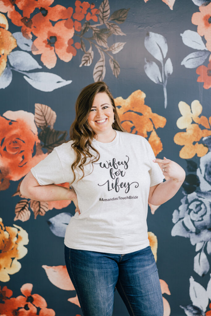 young woman smiling in wifey-for-lifey tshirt